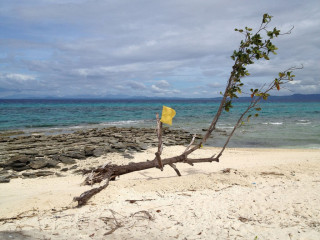Philippines, Malapascua, Beach with Flag