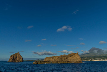 Azores, rocks of Ilheu Deitado in front of Pico