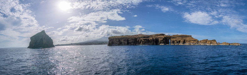 Azores, rocks of Ilheu Deitado in front of Pico