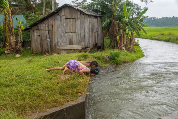 Philippines, Santa Ana, kids playing at water channel