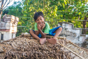 Philippines, Palawan, Puerto Princesa, kid smiling