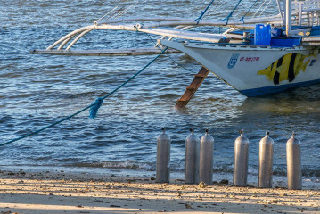 Philippines, dive tanks on the beach, Ticao Island