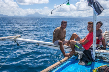 Philippines, bangka dive boat with crew, Ticao Island