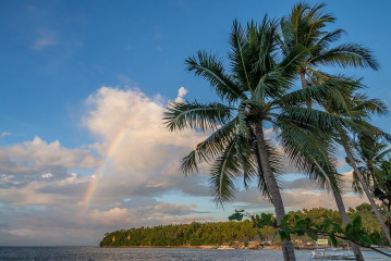 Philippines, rainbow at Ticao Island beach