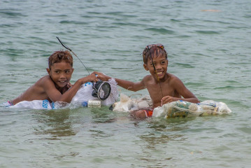 Philippines, kids playing at Ticao Island beach